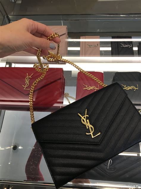 white ysl woc|ysl monogram chain wallet.